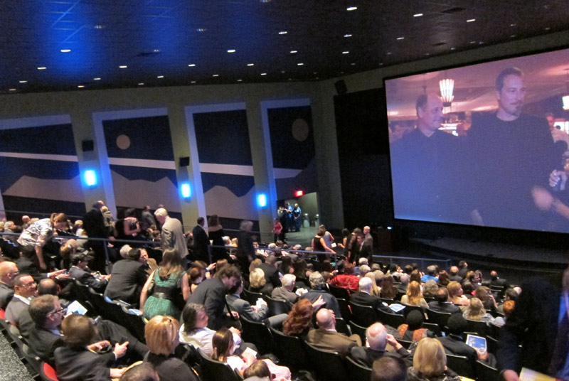 The Audience Takes their Seats while highlights from the LA Premiere Show