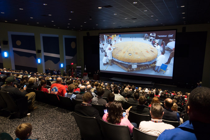 Crowd Gathers in 3D Theatre to Watch Orion